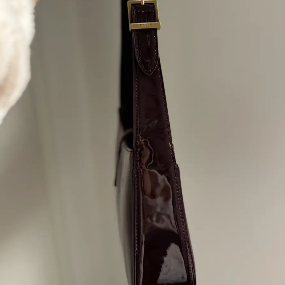 YVES SAINT LAURENT LE 5 À 7 BAG IN PATENT LEATHER